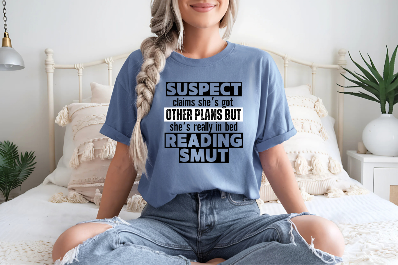 suspect claims she's got other plans but she's really in bed reading smut
