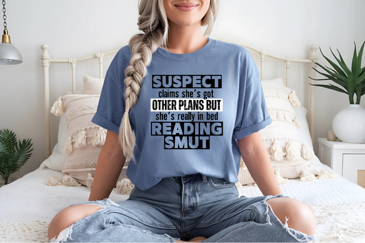 suspect claims she's got other plans but she's really in bed reading smut